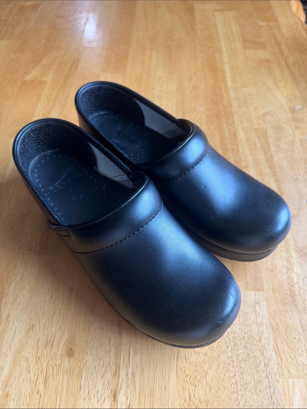 Dansko Kids Black Slip-On Clogs with Smooth Upper